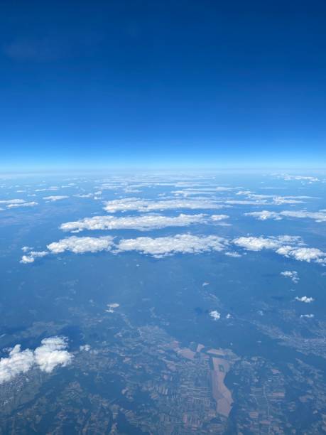 istock view from plane over europe blue sky 1882368488