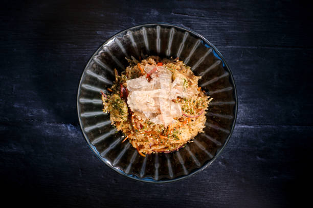 istock Delicious dish of rice in bowl served on black table 1882371573