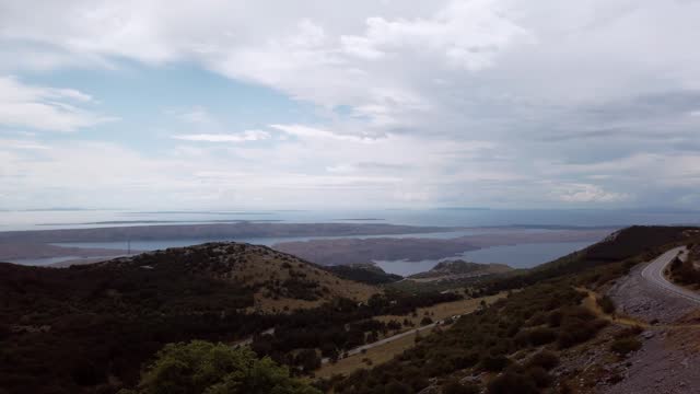 Spectacular panning video from Croatia, Velebit, Kubus Ura lookout point with the Mediterranean Sea and islands in the background.