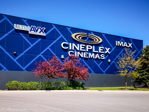 Oakville, Ontario, Canada - May 20, 2019: Cineplex Cinemas in Oakville, Ontario, Canada.  Cineplex Cinemas operated by Cineplex Inc. a Canadian entertainment company.