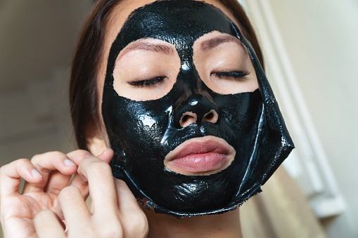 Black facial mask - beauty product