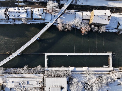 The city of Zurich the morning after heavy snowfall in early December 2023, the beautiful cityscape during winter. river Limmat, unterer Letten
