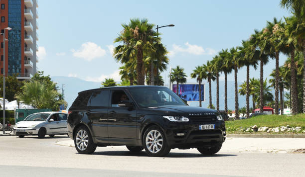 Range Rover Sport SUV in motion on the street of Vlora, Albania. Vlora, Albania-16.07.2020:Range Rover Sport SUV in motion on the street of Vlora, Albania. evoque stock pictures, royalty-free photos & images