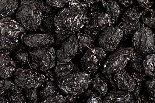 Prunes close-up. Dried smoked plums.