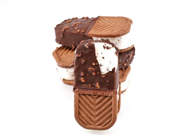 istock Sandwich ice cream half covered with biscuit and the other half with chocolate 1882574286