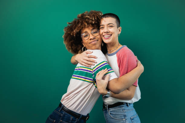istock Studio portrait of the two besties hugging 1882594789