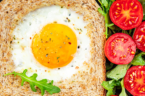 fried egg bread toast scrambled yolk protein delicious breakfast hearty food fresh delicious healthy eating cooking appetizer meal food snack on the table copy space food background rustic top view