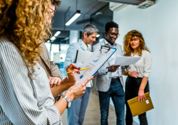 istock Business coworkers study the documents before a meeting 1882650426