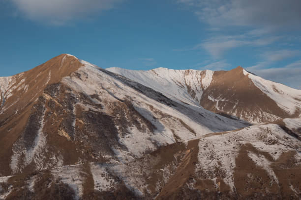 istock Mountains peak with little snow 1882671873