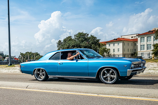 Gulfport, MS - October 05, 2023: Wide angle side view of a 1967 Chevrolet Chevelle SS Hardtop Coupe at a local car show.