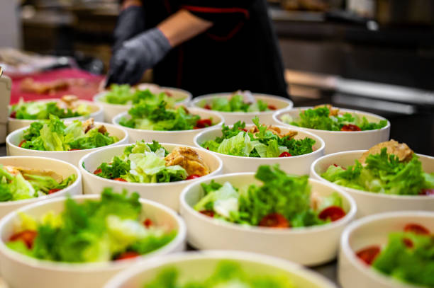 istock Chef cooking Caesar salad on restaurant kitchen 1882752766