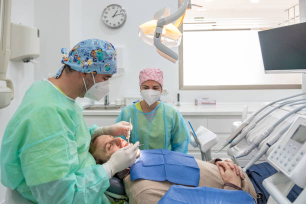 istock A patient having a dental check-up. 1882785901