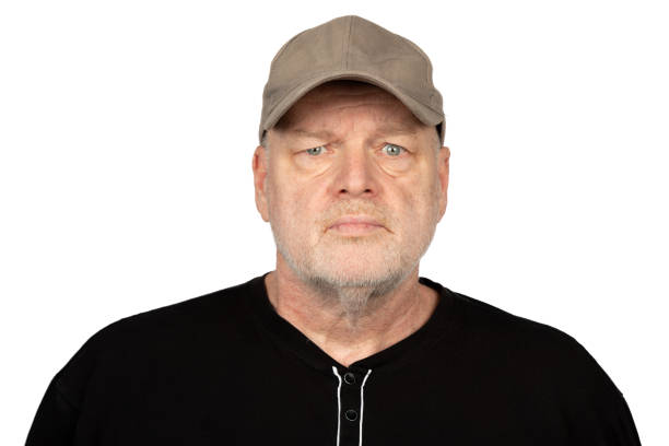istock Confident Middle-Aged Caucasian Man in Baseball Cap - Studio Portrait on White Background 1882843190