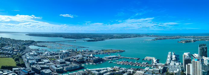Scenic panoramic views of Auckland skyline and financial downtown city center.