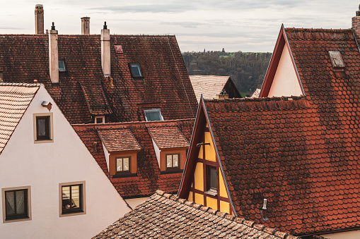 An aerial view of a classic European village with quaint rooftops