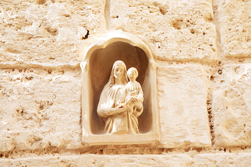 Sculpture in the wall of the city of Mdina