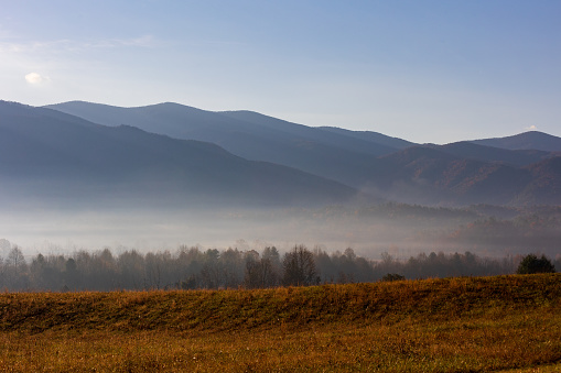 Scenic landscape featuring Sunrise in Cades Cover in the Great Smoky Mountains National Park in Tennessee