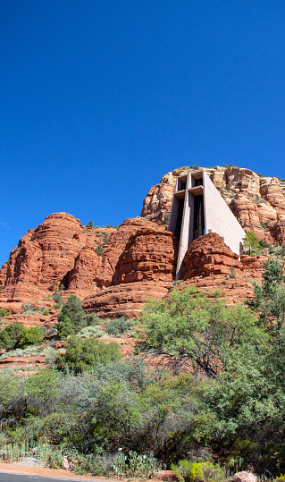 A spiritual moment at chapel of the holy cross in Arizona on a beautiful clear day with blue skies.