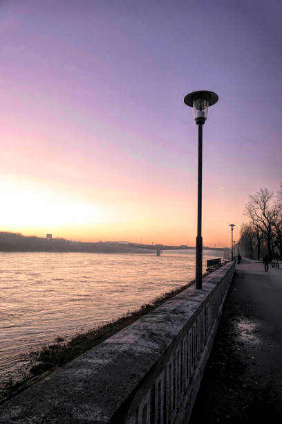 istock Vertical shot walkway along the river Danube in Bratislava in the evening. 1883216666