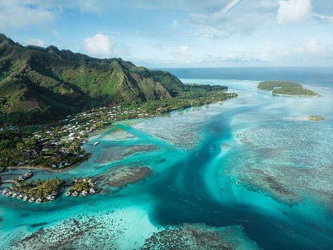An aerial view of French Polynesia Moorea tropical island on a sunny day
