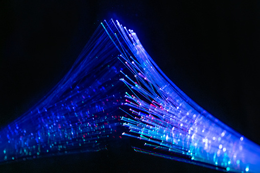 Blue fiber optic abstract light background