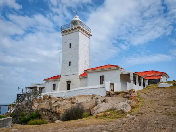 Cape St Blaize Lighthouse during a summer afternoon with blue sky and white clouds, Mossel Bay, Western Cape, South Africa