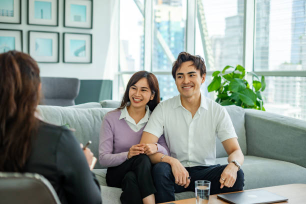 istock Happy couple satisfied on counselling appointment 1883236568