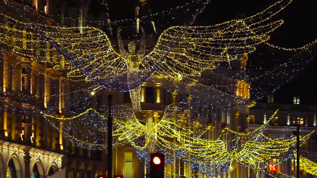 Regent Street Angels Light Display, West End, Central London, Christmas Fairy Lights, Flying Angel Figures Night, Festive Xmas Season Decorations