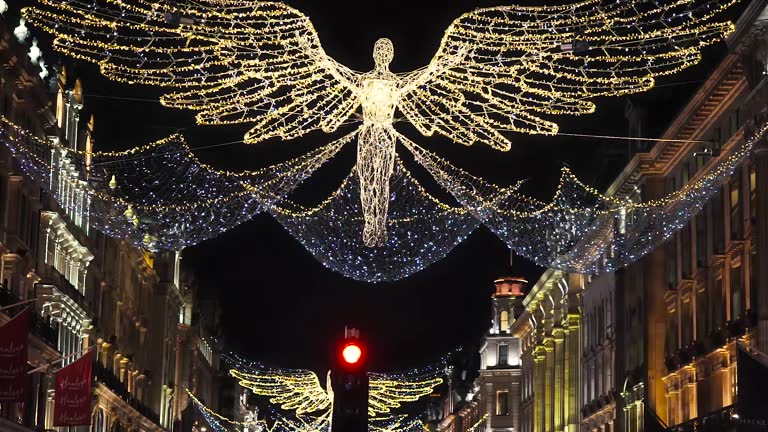 Regent Street Angels Light Display, West End, Central London, Christmas Fairy Lights, Flying Angel Figures Night, Festive Xmas Season Decorations