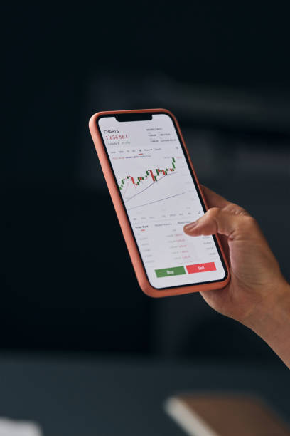 istock An Unrecognizable Businesswoman Using Her Mobile Phone While Doing Some Research 1883285448