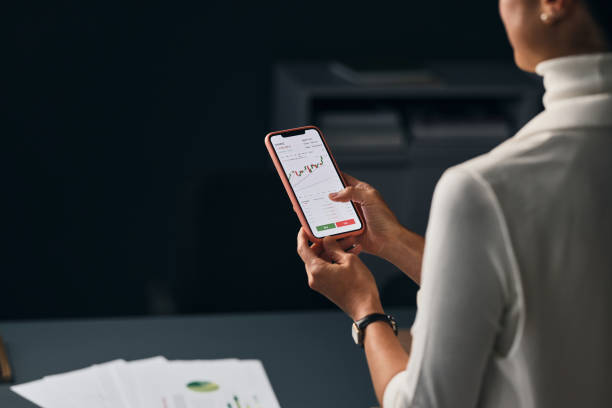 istock An Unrecognizable Asian Businesswoman Using Her Mobile Phone While Working In The Office 1883288540