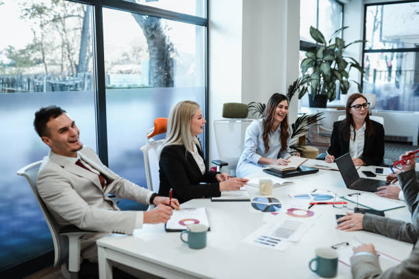istock Laughs And Positive Emotion During Business Meeting Indicating Success 1883289048