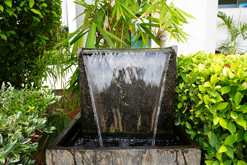 Hotel Spa image. Outdoor Hotel pool and waterfall.