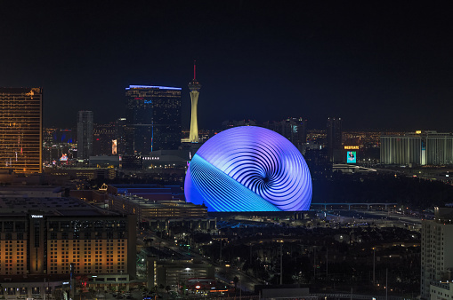 Las Vegas, Nevada, United States:  Las Vegas cityscape at night, looking north, including The Sphere at the Venetian, Stratosphere Hotel, and Fontainebleau Las Vegas.