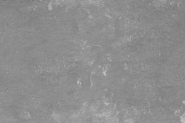 Free space for an inscription. Can be used as a background or poster. Fragment of a wall with bumps and peeling paint.