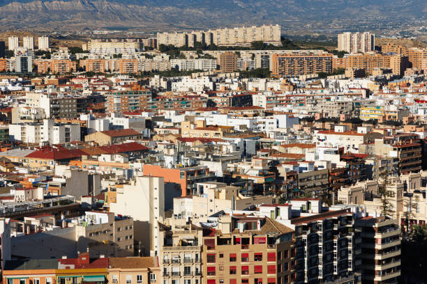 istock Roofs of houses in dense urban development 1883468519