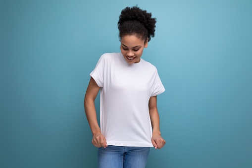 young hispanic brunette woman dressed in white t-shirt with printable template.