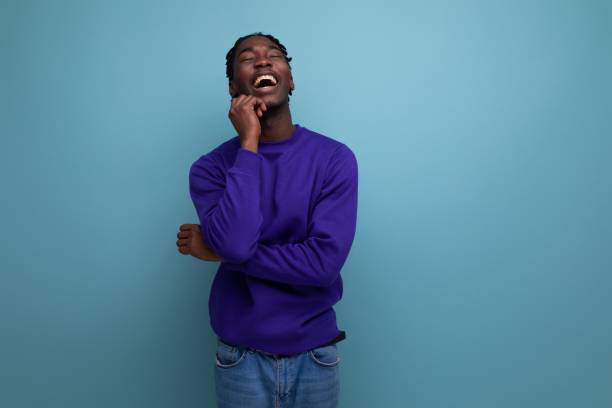 istock pensive dark-skinned african young man with dreadlocks in casual clothes 1883525741