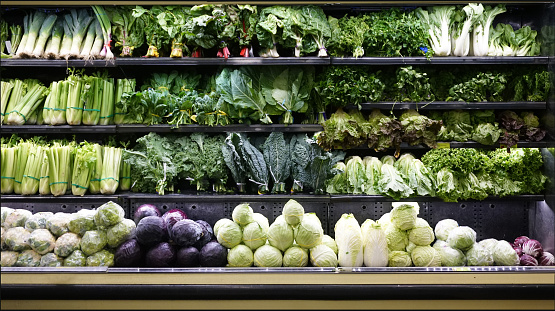 fresh green vegetable on shelf in grocery store for sale