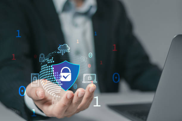 istock cybersecurity concept, man hand holding padlock icon with shield for protecting cyber privacy information. secure internet access technology, security encryption of user private data. 1883689234
