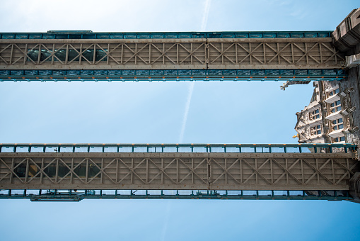 London, October,10 2023 : Traveling on London tower bridge in the sunny day, Architectures on two side of River Thames.