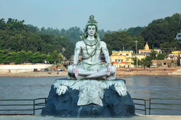 Statue of Hindu God,Shiva along the river ganges  in Rishikesh , Uttarakhand India.
