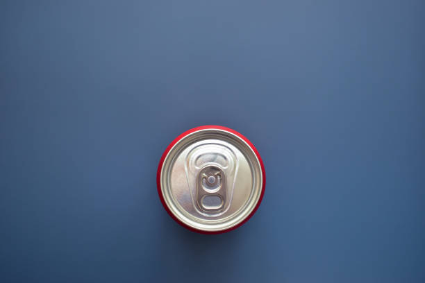 istock aluminium red cans soft drink put on blue texture background 1883825057