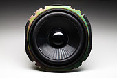 Black audio speaker is on a white background with shadow, Hi-Fi sound system