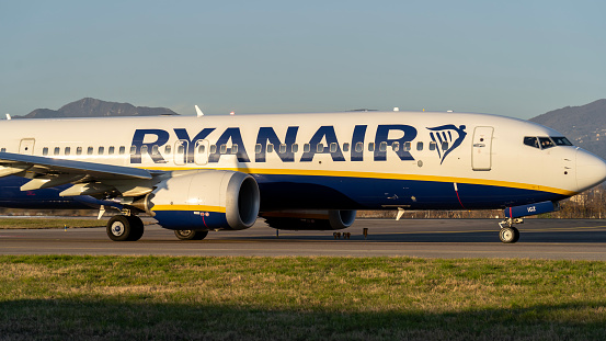 Bergamo, Italy. A Ryanair Boeing 737-800 is taxiing to the runway for take-off at the Bergamo Milano International Airport