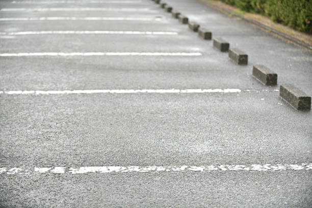 istock parking lot wet in the rain 1884079599