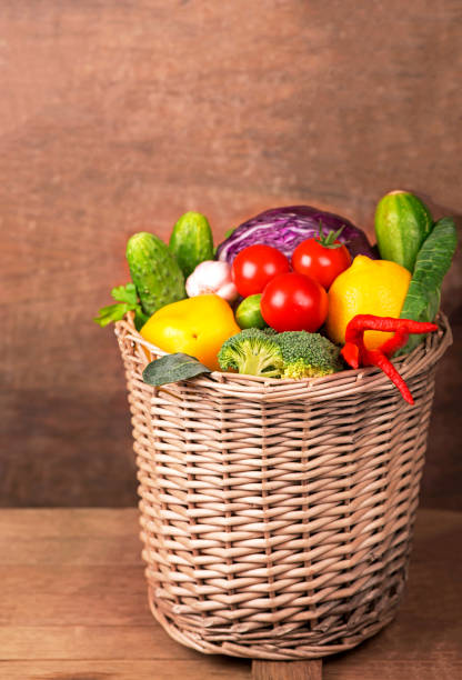 istock Healthy Organic Vegetables on a Wooden Background 1884129131