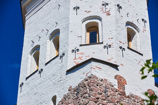 Viborg, Russia - May 30, 2021: The Old Clock Tower of Vyborg, the former bell tower of the cathedral.