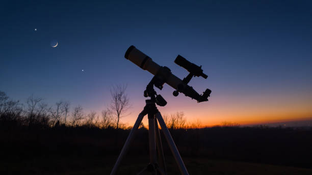 istock Astronomical telescope for observing stars, planets, Moon, celestial objects in the sky. 1884221195