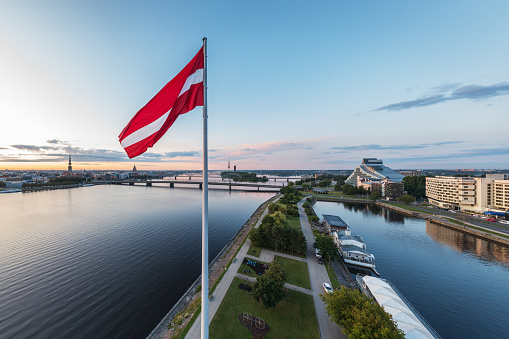 Picture from a drone of the huge Latvian flag above AB dam. River Daugava with it's bridges can be seen on the left.